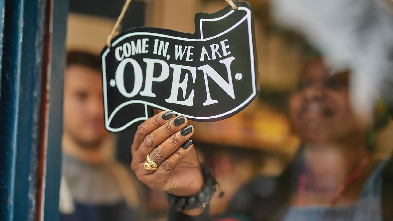 Open sign on a small business front door